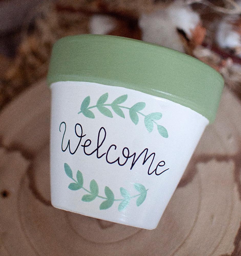 Cache pot / Pot de fleur en terre cuite bicolore : Welcome