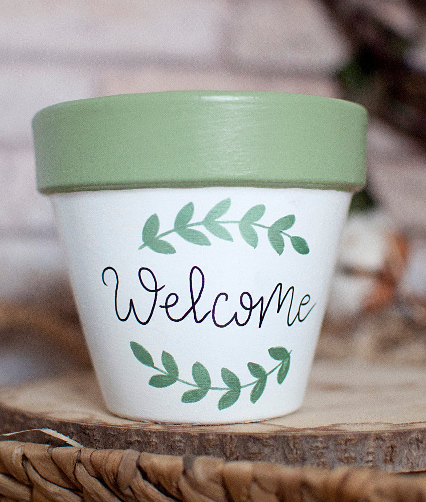 Cache pot / Pot de fleur en terre cuite bicolore : Welcome