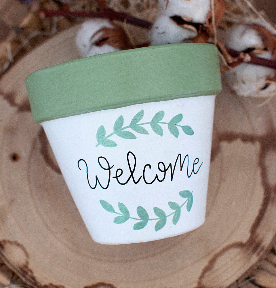 Cache pot / Pot de fleur en terre cuite bicolore : Welcome